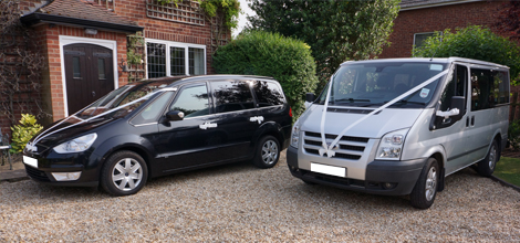 Wedding cars parked on a driveway